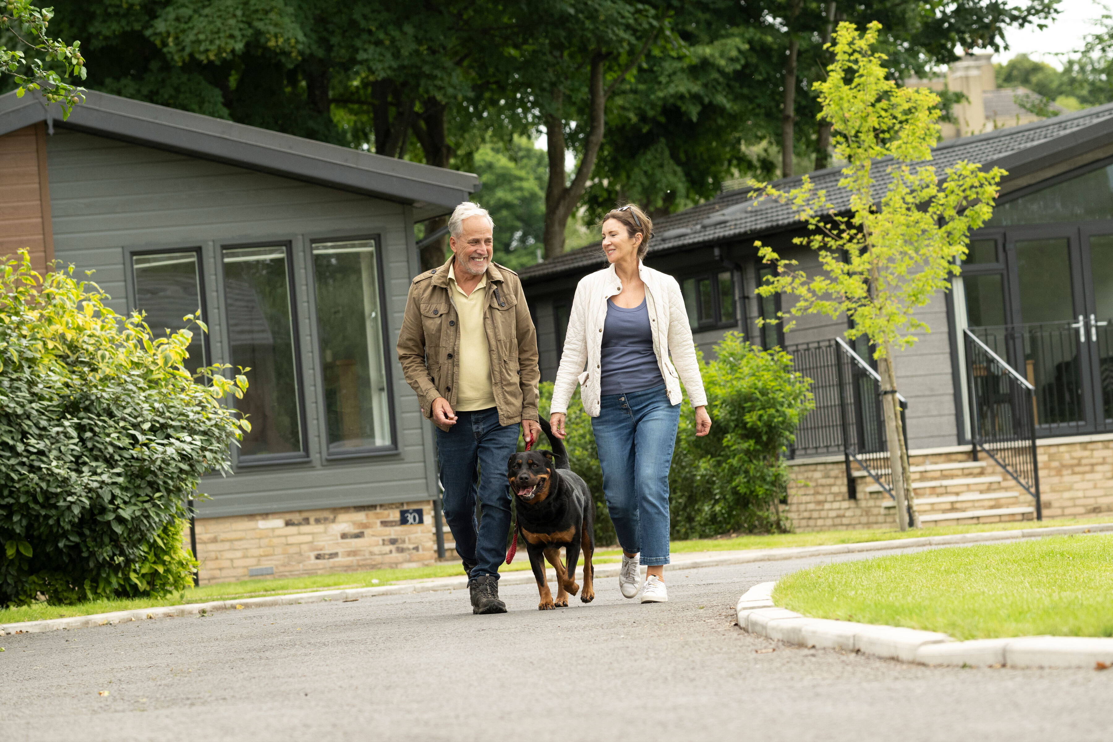 Couple walking through Merley Court Couple walking through Merley Court